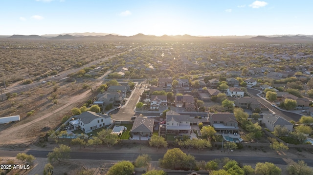 drone / aerial view featuring a mountain view and a residential view
