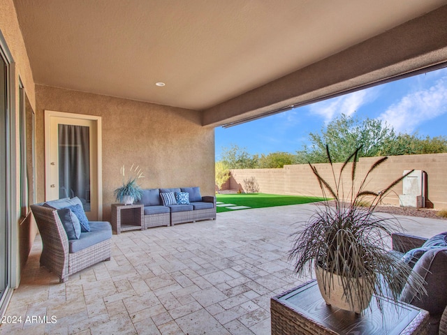 view of patio / terrace featuring a fenced backyard and an outdoor living space