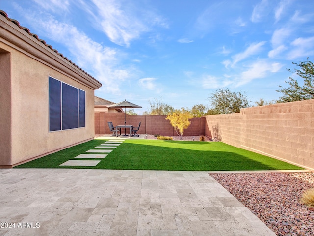 view of yard with a patio area