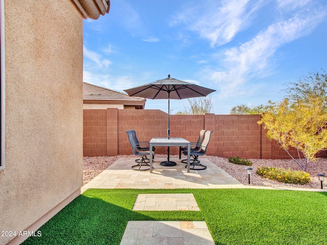 view of patio with fence