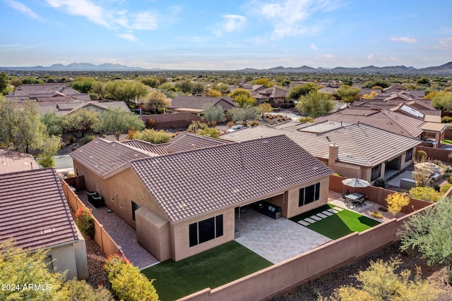 drone / aerial view featuring a mountain view