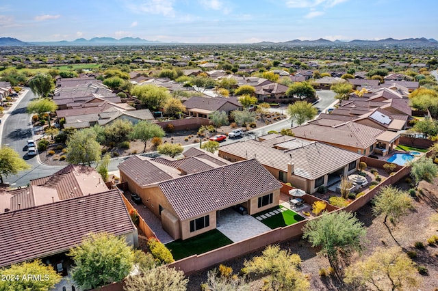 drone / aerial view with a residential view and a mountain view