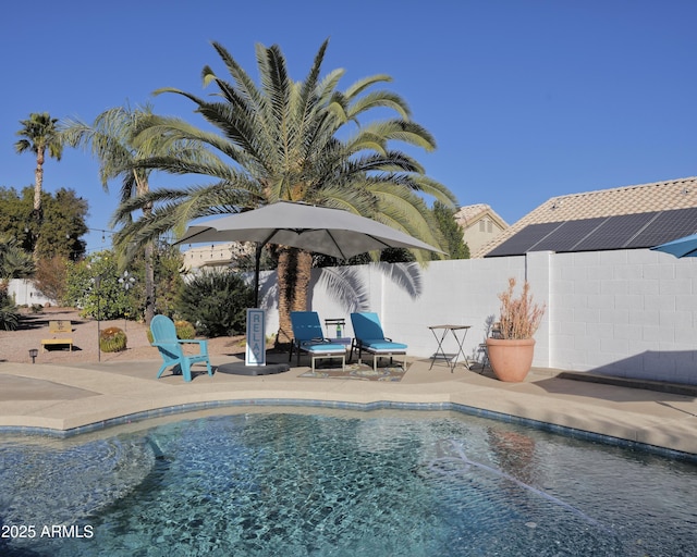 view of swimming pool featuring a patio