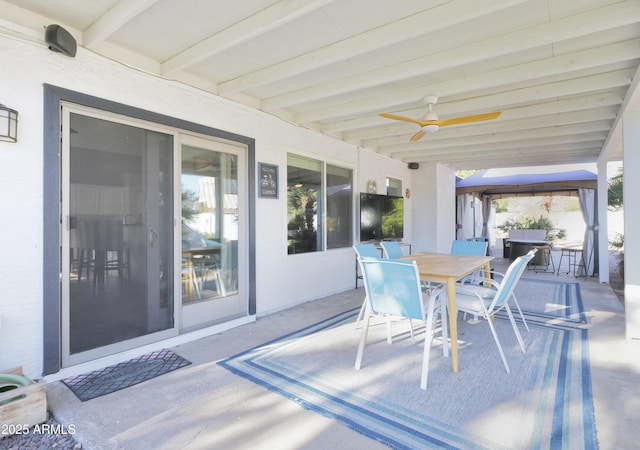 view of patio with ceiling fan