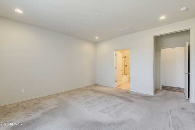27413 W Tonopah Dr, Buckeye, AZ 85396 - empty room featuring light carpet, recessed lighting, a smoke detector, and baseboards