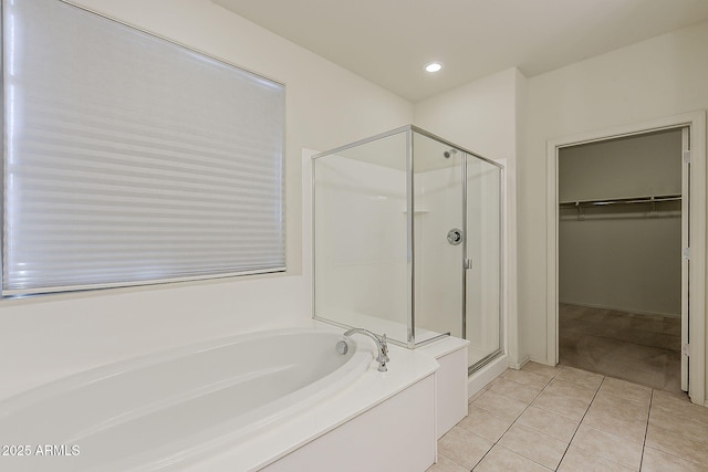 27413 W Tonopah Dr, Buckeye, AZ 85396 - bathroom with a stall shower, tile patterned floors, a garden tub, a spacious closet, and recessed lighting