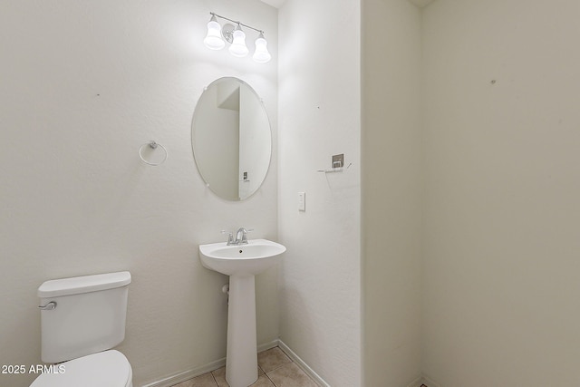 27413 W Tonopah Dr, Buckeye, AZ 85396 - bathroom featuring toilet and tile patterned floors