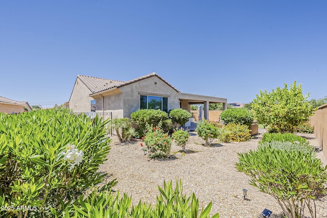 27413 W Tonopah Dr, Buckeye, AZ 85396 - view of front of house featuring stucco siding and a tile roof