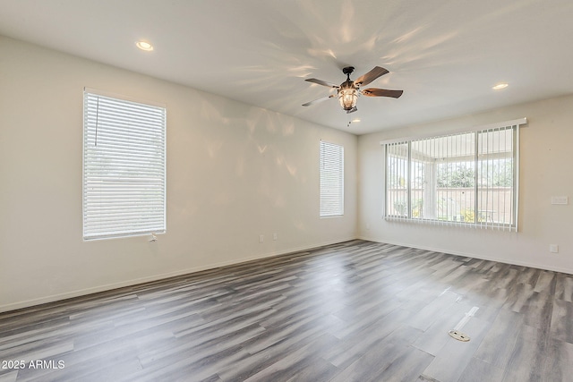 27413 W Tonopah Dr, Buckeye, AZ 85396 - unfurnished room with wood finished floors, ceiling fan, recessed lighting, and baseboards