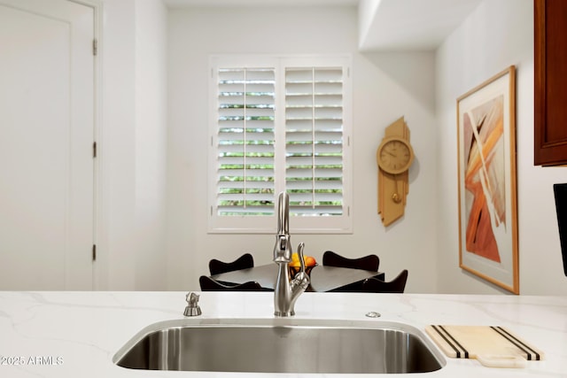 3801 N Goldwater Blvd Unit 201, Scottsdale, AZ 85251 - detailed view of a sink and light stone countertops