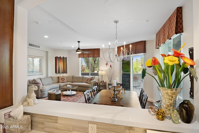3801 N Goldwater Blvd Unit 201, Scottsdale, AZ 85251 - living room with a chandelier and recessed lighting