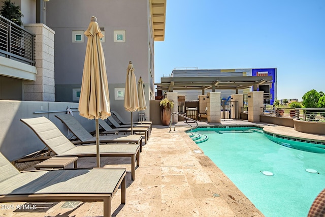 3801 N Goldwater Blvd Unit 201, Scottsdale, AZ 85251 - community pool featuring a patio