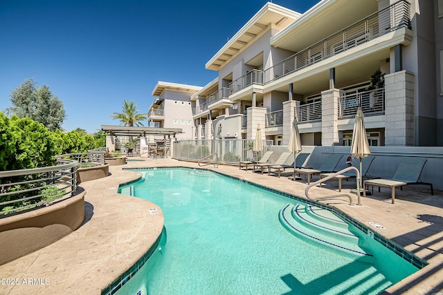 3801 N Goldwater Blvd Unit 201, Scottsdale, AZ 85251 - community pool featuring a patio and a pergola