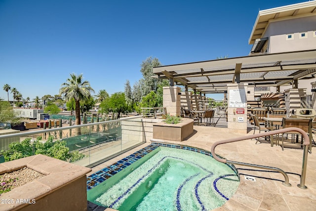 3801 N Goldwater Blvd Unit 201, Scottsdale, AZ 85251 - view of pool featuring a hot tub and a patio area