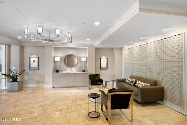 3801 N Goldwater Blvd Unit 201, Scottsdale, AZ 85251 - living room featuring baseboards, ornamental molding, stone tile flooring, recessed lighting, and a chandelier