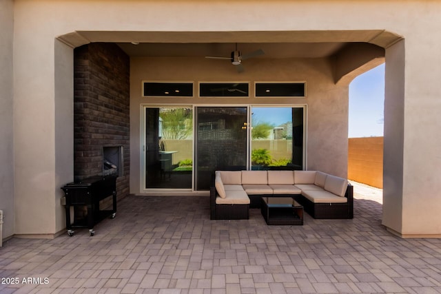 view of patio / terrace with outdoor lounge area and ceiling fan