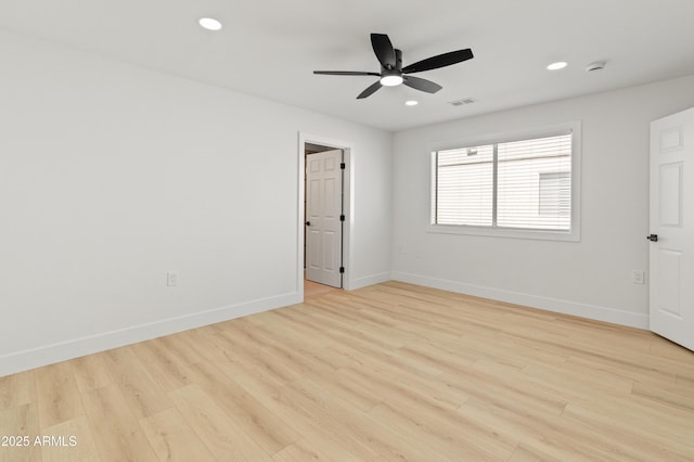 3221 N 37th St Unit 26, Phoenix, AZ 85018 - spare room featuring baseboards, a ceiling fan, wood finished floors, recessed lighting, and a smoke detector