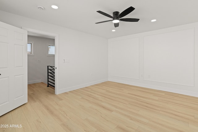 3221 N 37th St Unit 26, Phoenix, AZ 85018 - unfurnished room featuring light wood finished floors, recessed lighting, a ceiling fan, a smoke detector, and baseboards