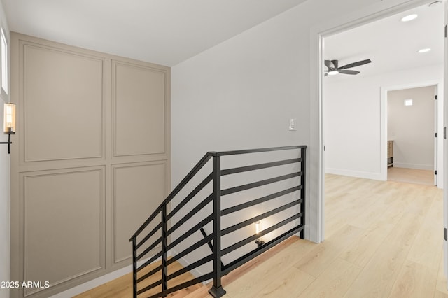 3221 N 37th St Unit 26, Phoenix, AZ 85018 - stairway featuring wood finished floors, recessed lighting, baseboards, and a ceiling fan