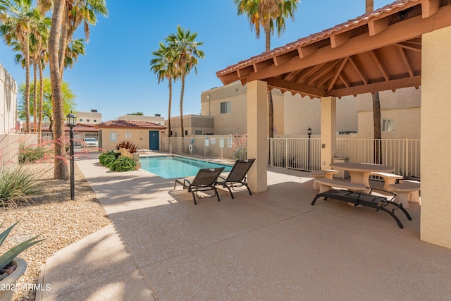 3221 N 37th St Unit 26, Phoenix, AZ 85018 - community pool featuring a patio, fence, and a gazebo