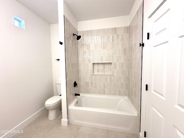 full bath featuring toilet, baseboards, tile patterned flooring, and bathtub / shower combination