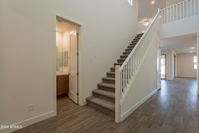 stairway with wood-type flooring