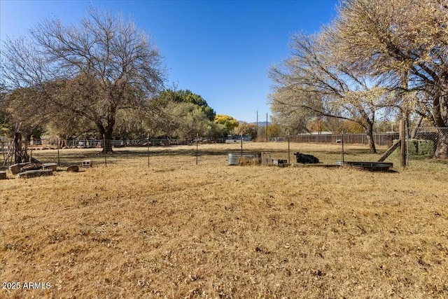 view of yard with a rural view