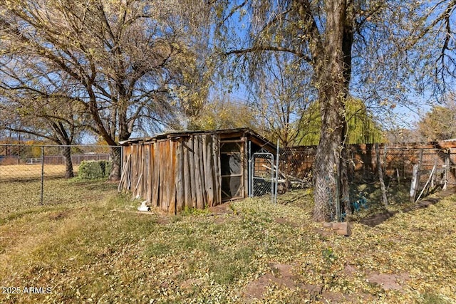 view of outdoor structure with a lawn