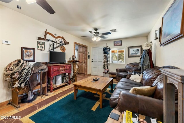 living room with ceiling fan