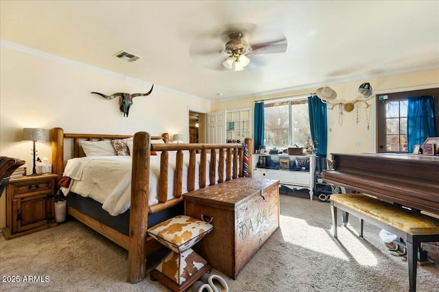 bedroom with light colored carpet, ornamental molding, and ceiling fan