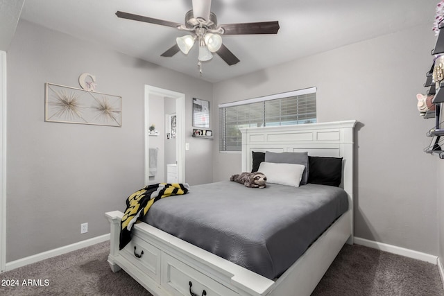 bedroom featuring dark colored carpet and ceiling fan