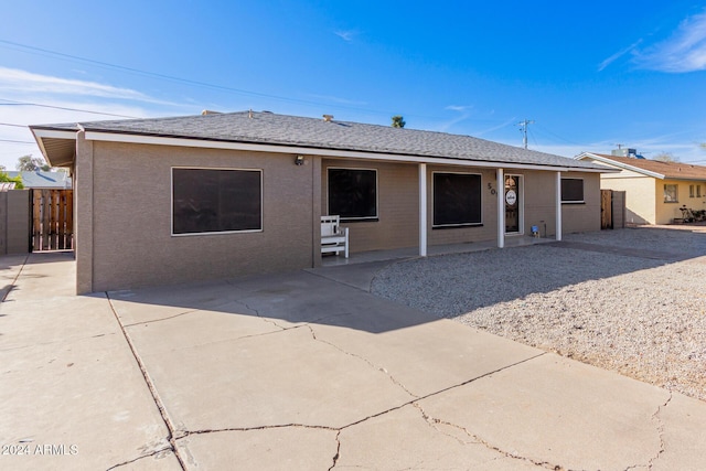 view of front of property featuring a patio