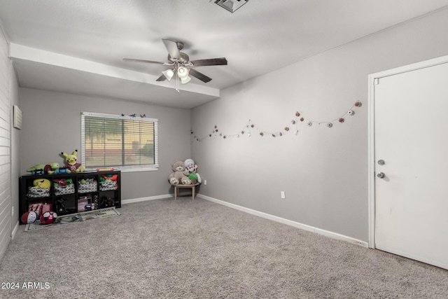 rec room with carpet floors and ceiling fan