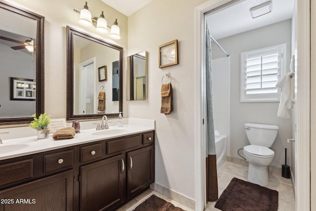 full bathroom featuring vanity, tile patterned flooring, toilet, and shower / bath combination