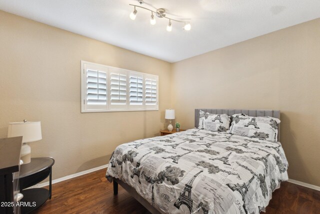 bedroom featuring dark hardwood / wood-style floors