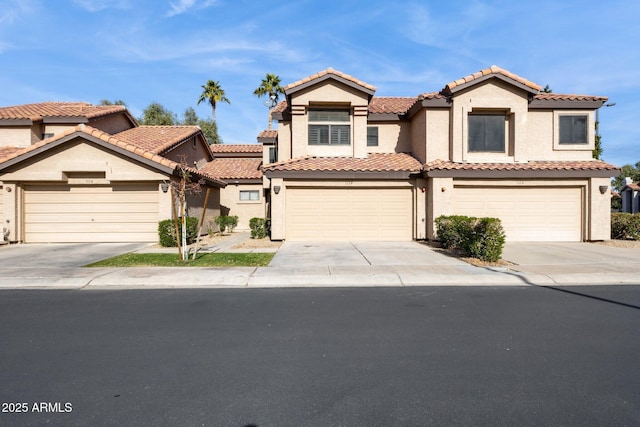 mediterranean / spanish-style home featuring a garage