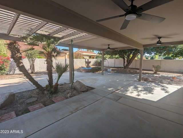 view of patio featuring a pergola and ceiling fan