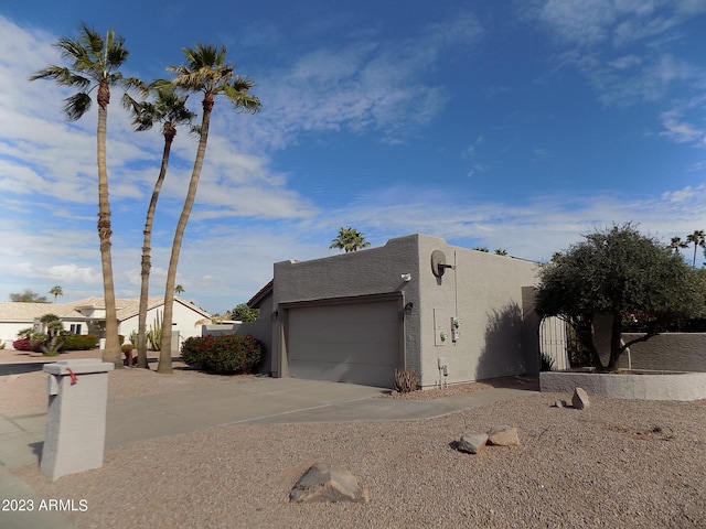 view of home's exterior with a garage