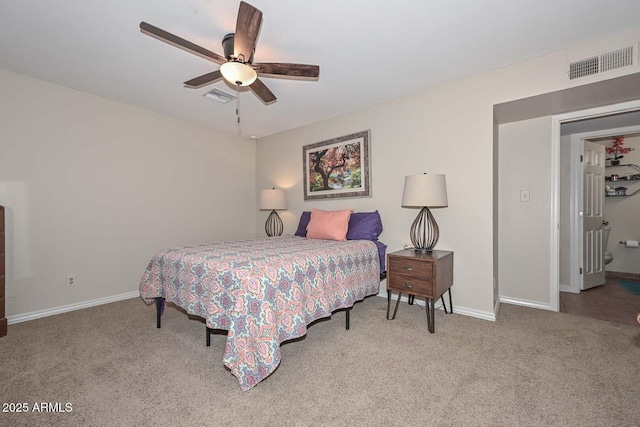 carpeted bedroom with baseboards, visible vents, and ceiling fan