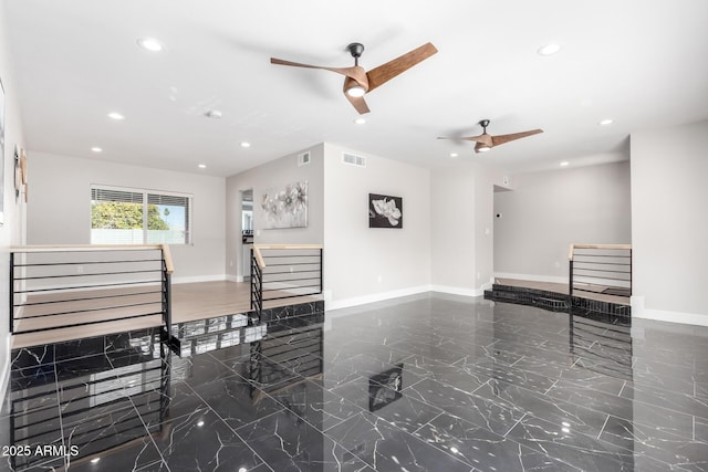 interior space featuring ceiling fan