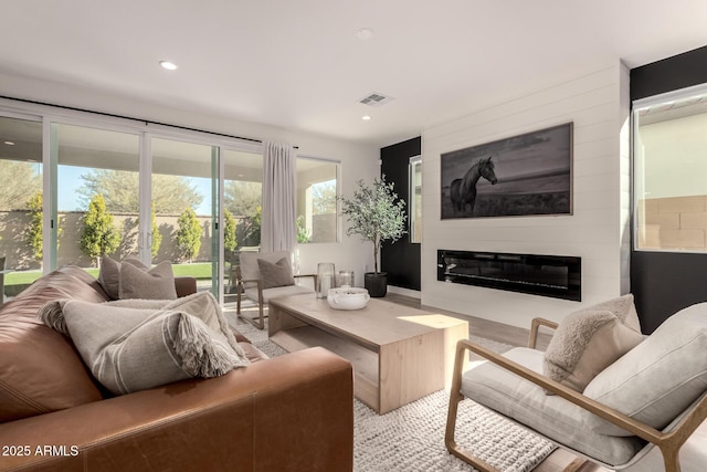 living room with a large fireplace