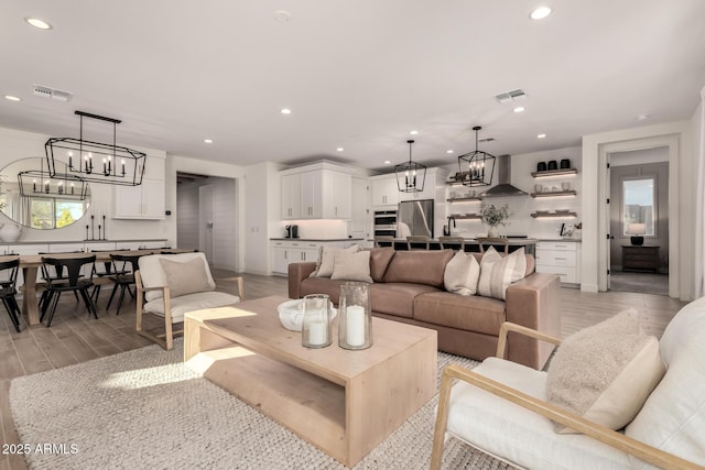 living room with light hardwood / wood-style floors