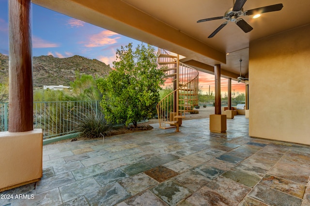35824 N Tom Darlington Dr, Carefree, AZ 85377 - view of patio featuring stairs, ceiling fan, and a mountain view
