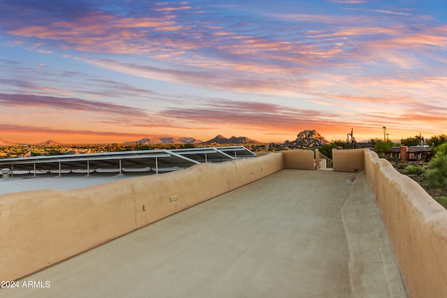 35824 N Tom Darlington Dr, Carefree, AZ 85377 - patio terrace at dusk featuring a mountain view