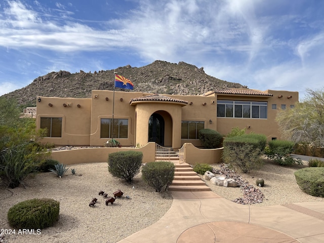 35824 N Tom Darlington Dr, Carefree, AZ 85377 - pueblo-style home featuring a mountain view, stucco siding, and a tiled roof