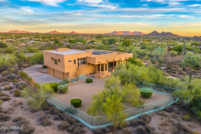 35824 N Tom Darlington Dr, Carefree, AZ 85377 - aerial view at dusk of a mountain view