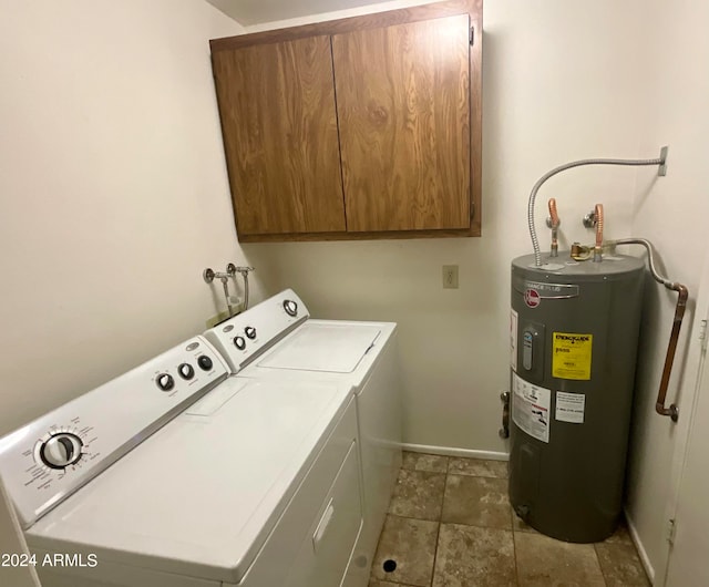 laundry area featuring separate washer and dryer, electric water heater, and cabinets