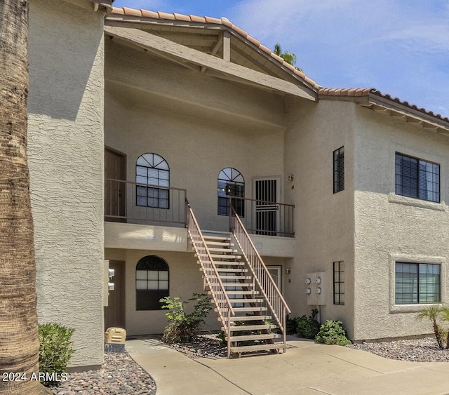 view of property with stairs