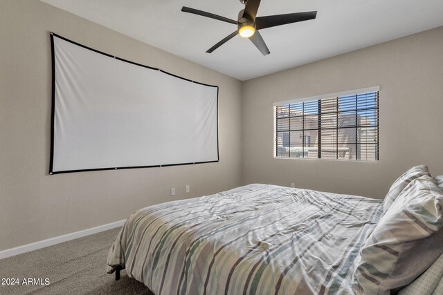 bedroom featuring ceiling fan and carpet floors