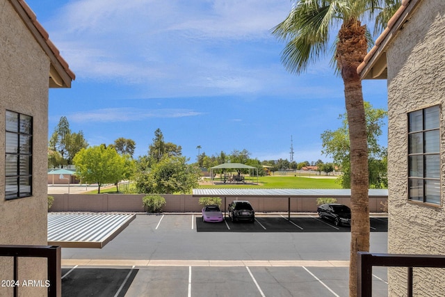 uncovered parking lot with fence